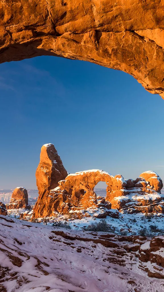 Turret Arch framed by North Window in Arches National Park, Utah, United States