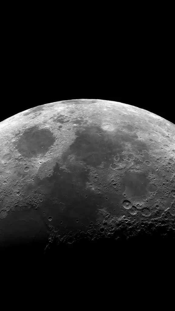 The moon's surface seen through a telescope